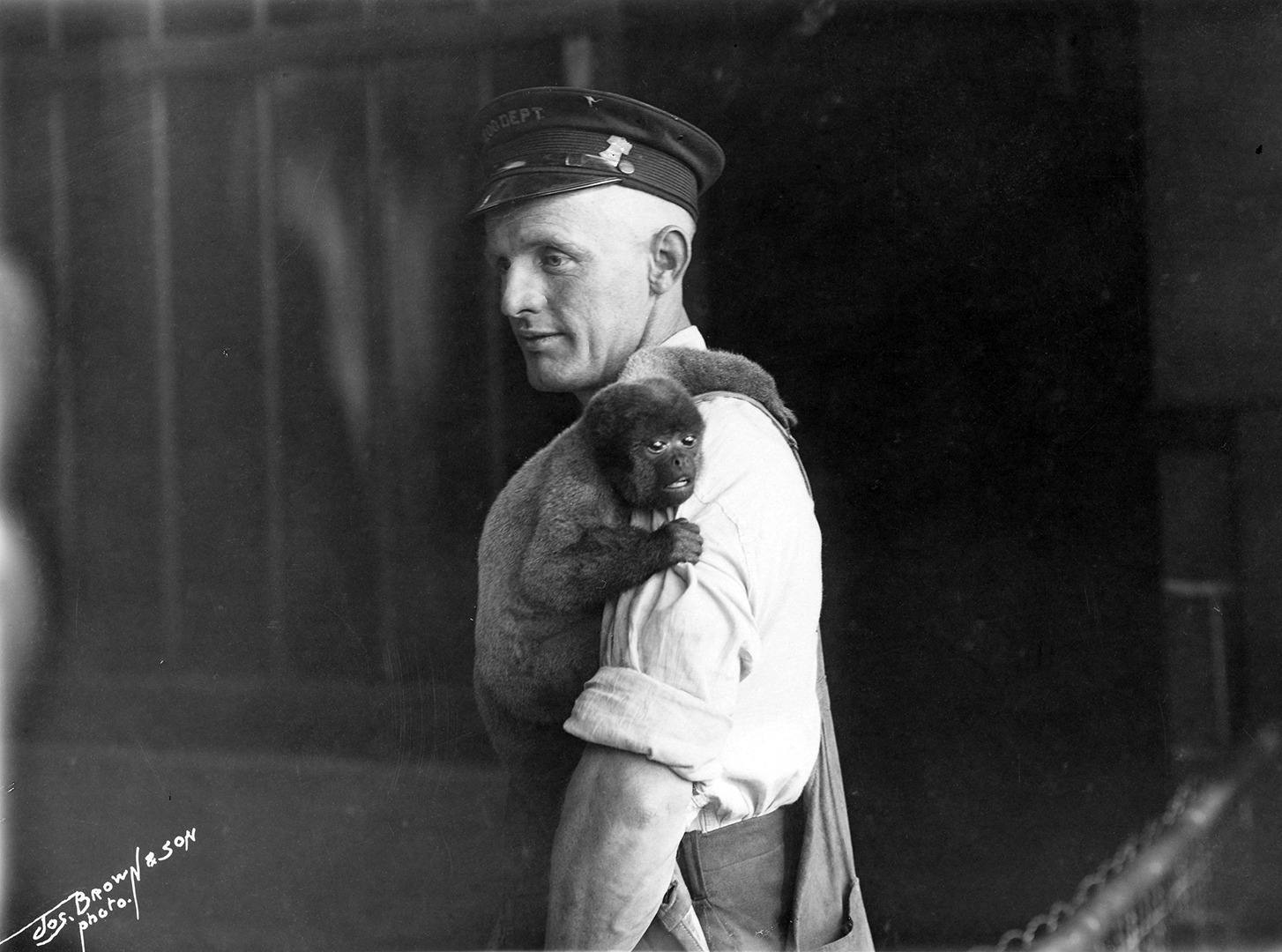 Keeper with monkey