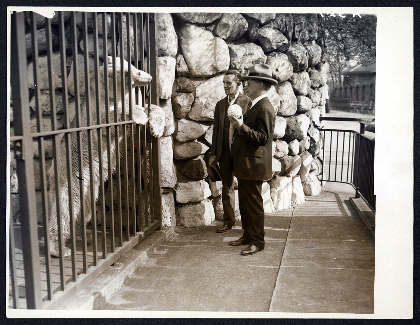 Alfred Parker (in hat) & animal dealer Louis Ruhe, 1920